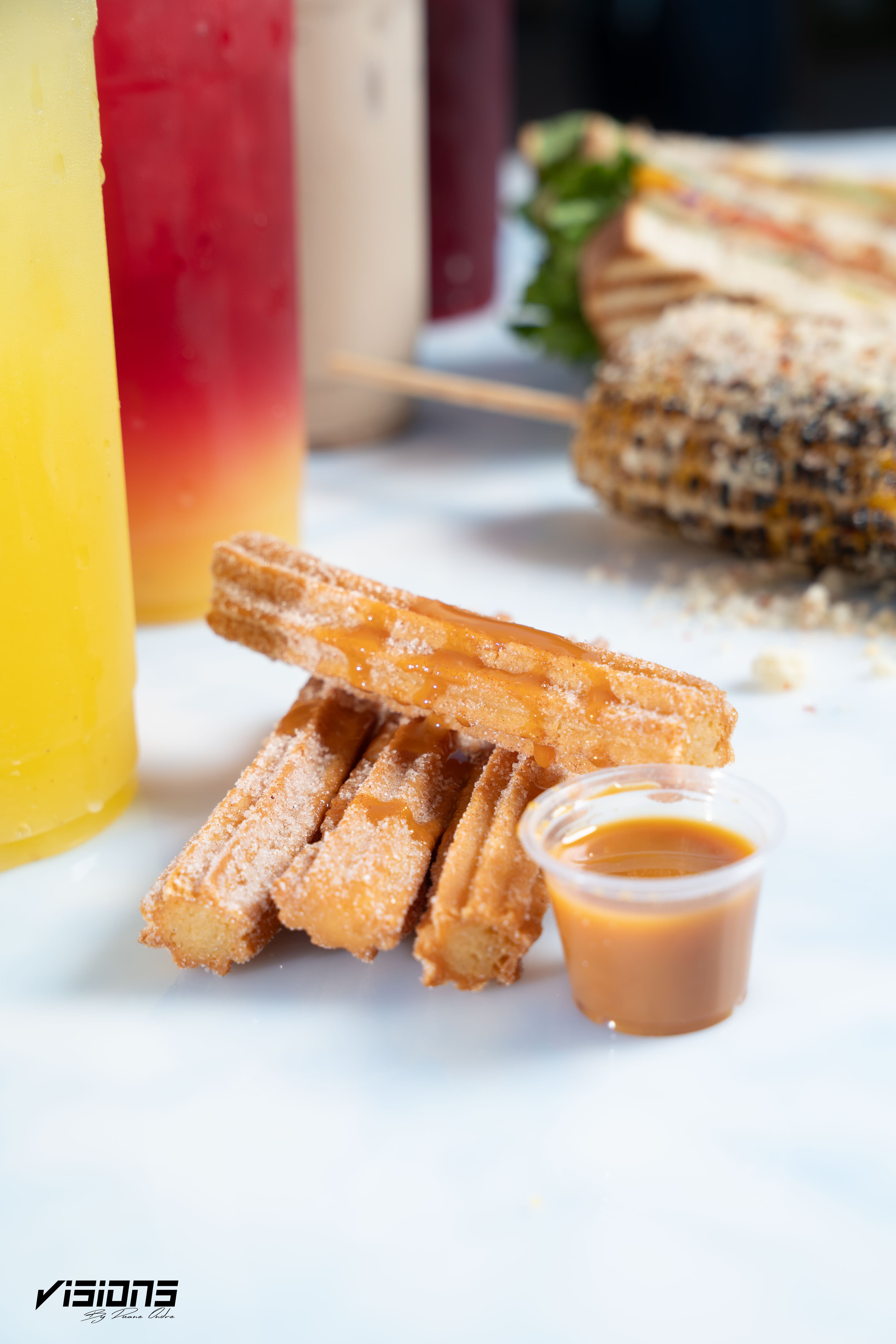 Catrinas churros served with caramel